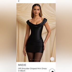 Brand new Oh Polly 
Still in packaging 

Off-Shoulder Draped Mini Dress in Black